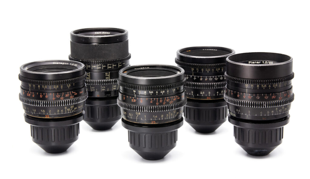 Collection of camera lenses arranged neatly