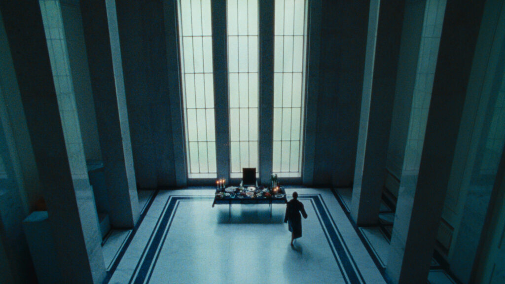 High angle wide shot of high ceiling room with large windows. Organic film feel due to the use of Zeiss High Speeds.
