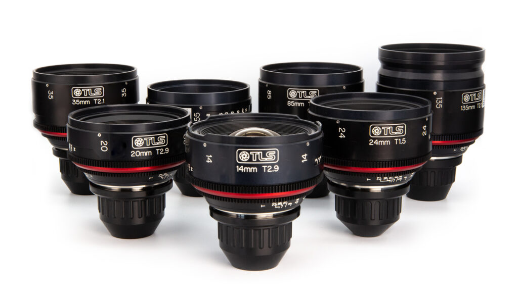 Collection of camera lenses arranged together.