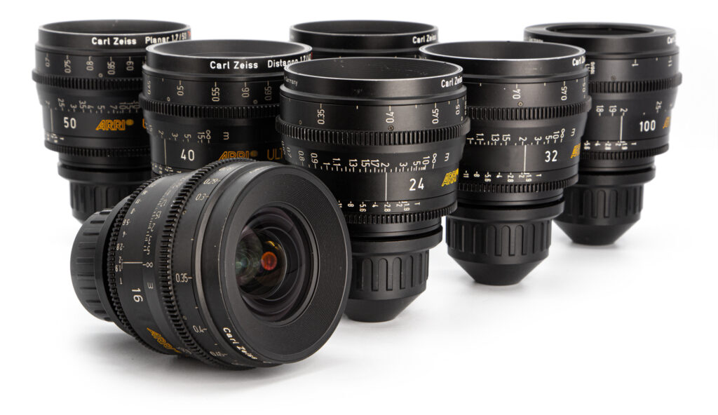 Collection of camera lenses arranged neatly