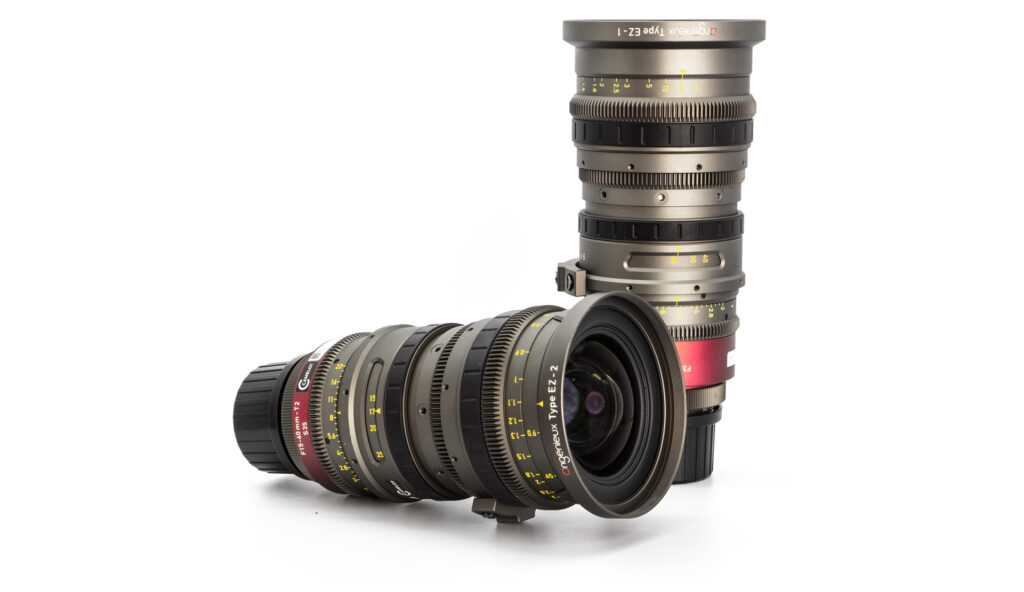Two camera lenses on white background