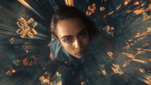 Portait of giant girl between skyscrapers shot from above on ARRI Ultra Primes. 