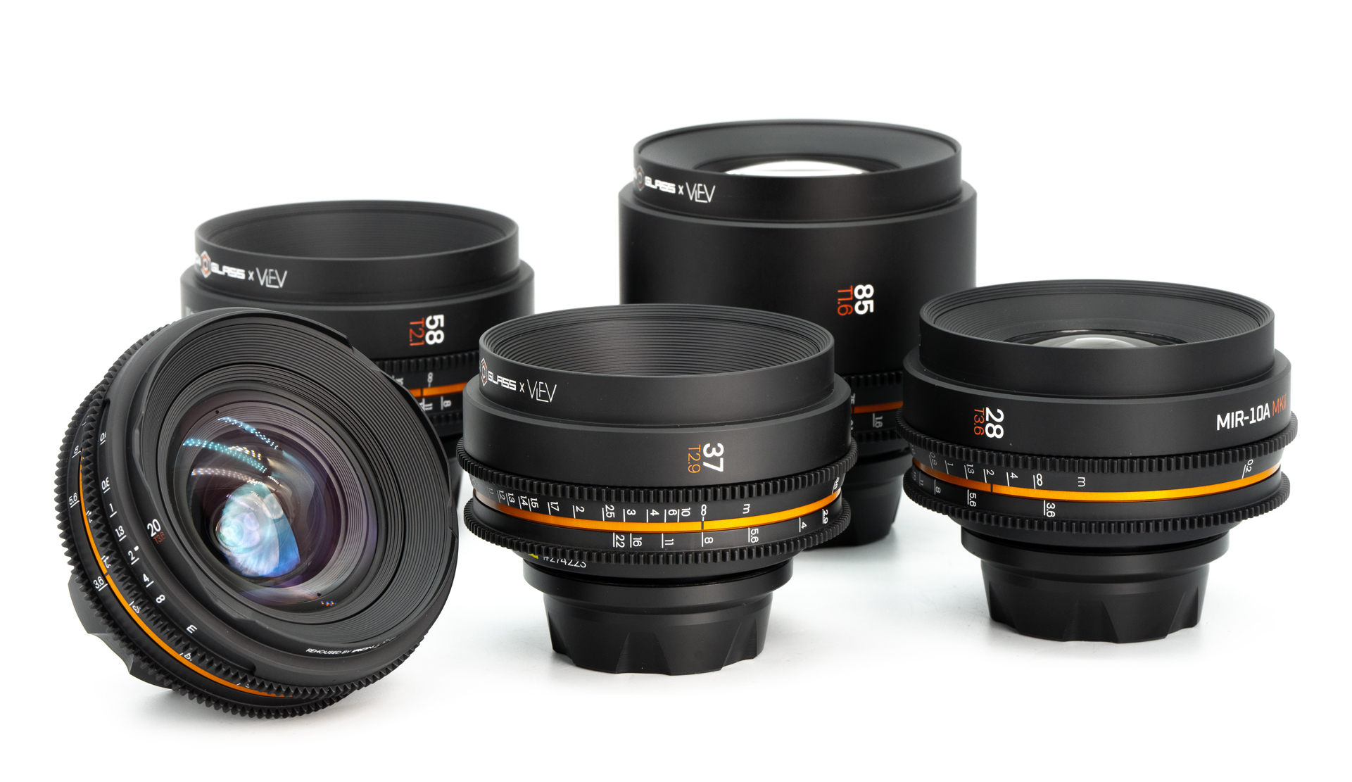 You see a set of professional Cine Lenses. They are infant of a white background. The name of the lenses are Helios or Ironglass Lenses.