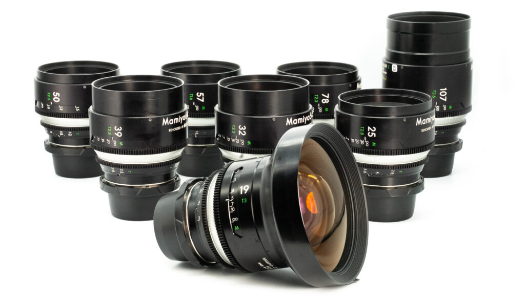 Collection of camera lenses arranged creatively