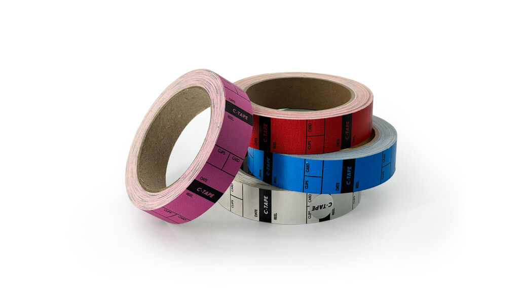 Four rolls of colorful tape.