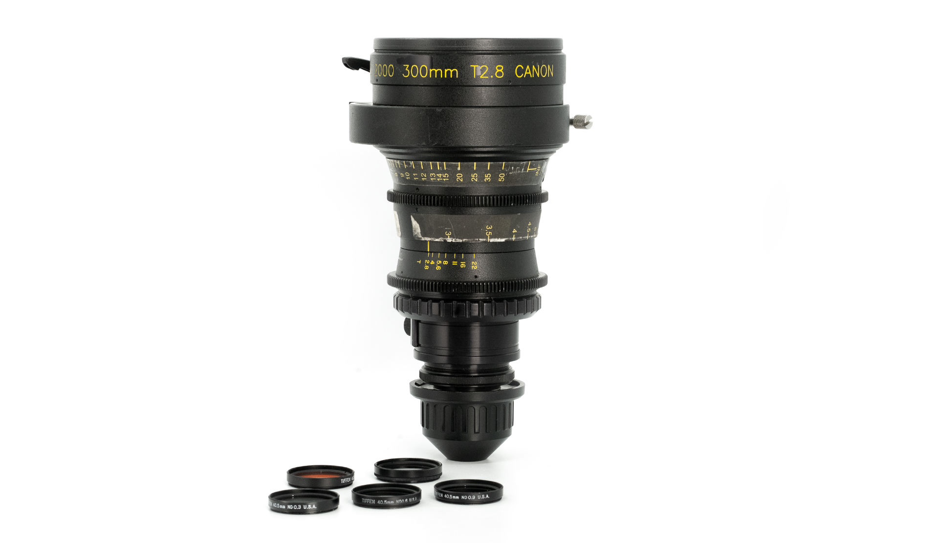 Canon 300mm T2.8 Century Rehoused cinema lens with PL mount, vintage telephoto cine lens shown with filter set on white background.