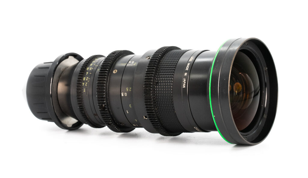 CANON 8-64mm Black camera lens with green accents