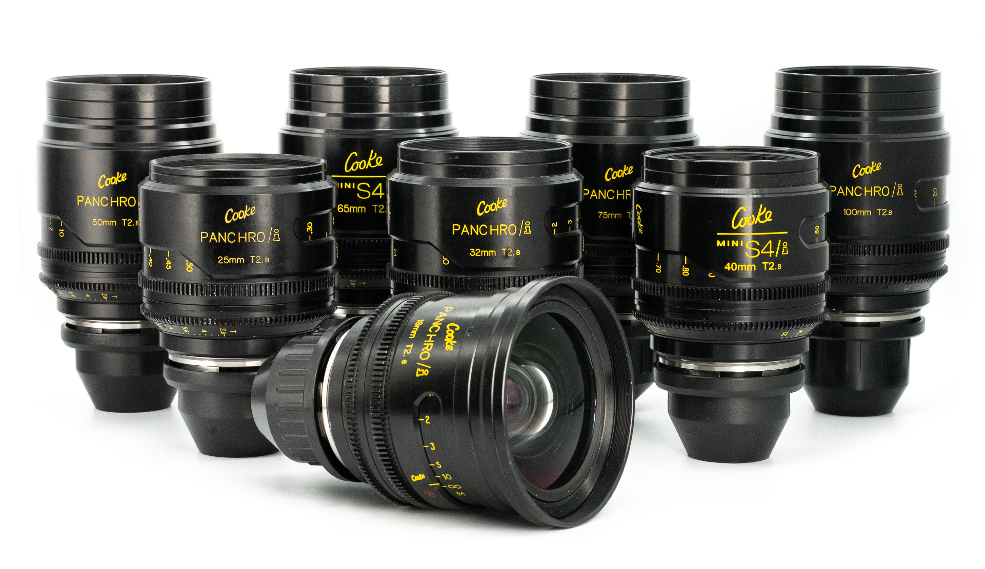 Set of Cooke mini S4/i and Cooke Panchro/i T2.8 cinema lenses arranged in a group on a white background, showing multiple focal lengths including 25mm, 32mm, 40mm, 50mm, 65mm, 75mm and 100mm, with one lens positioned in front displaying its front glass.